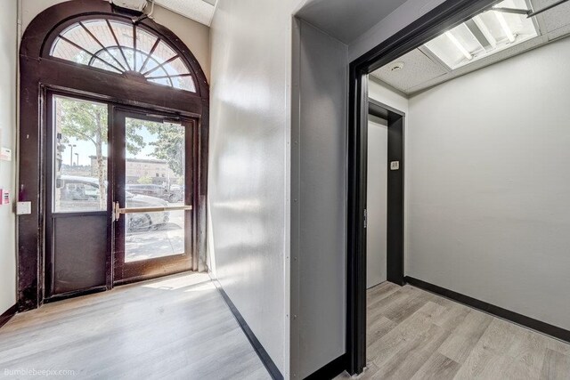 entrance foyer with light hardwood / wood-style floors