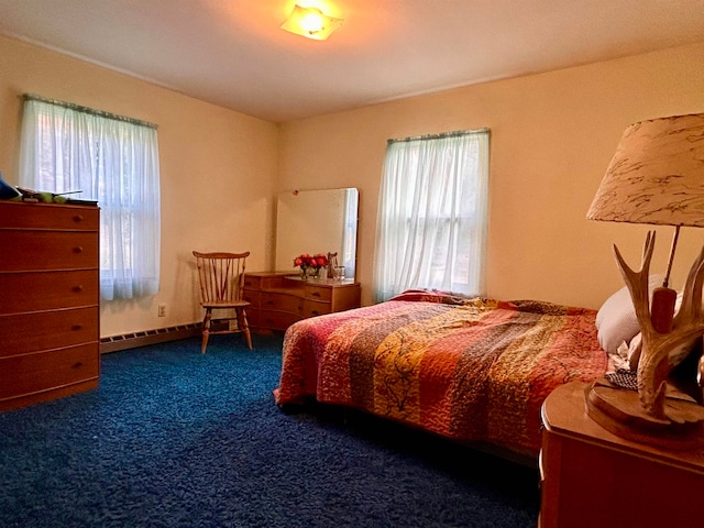 bedroom featuring dark carpet