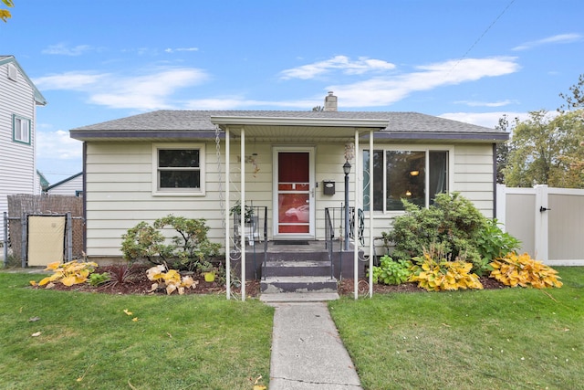 bungalow with a front lawn