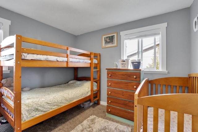 bedroom featuring light colored carpet