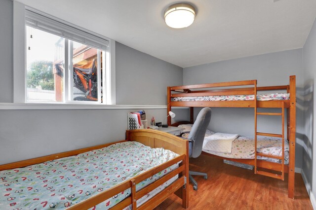 bedroom featuring wood-type flooring