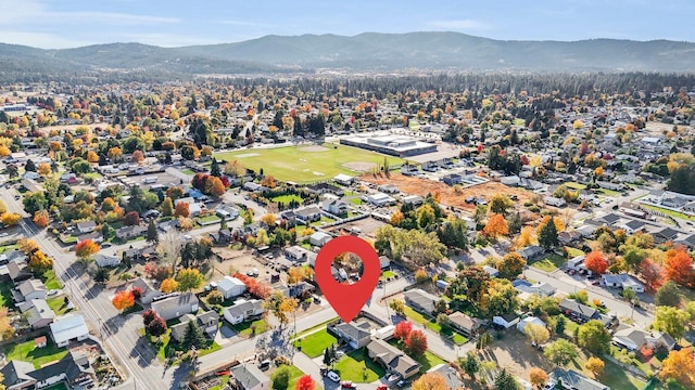 drone / aerial view featuring a mountain view