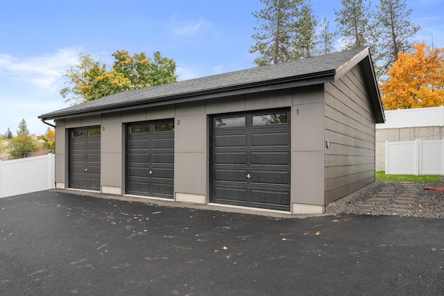 garage featuring fence