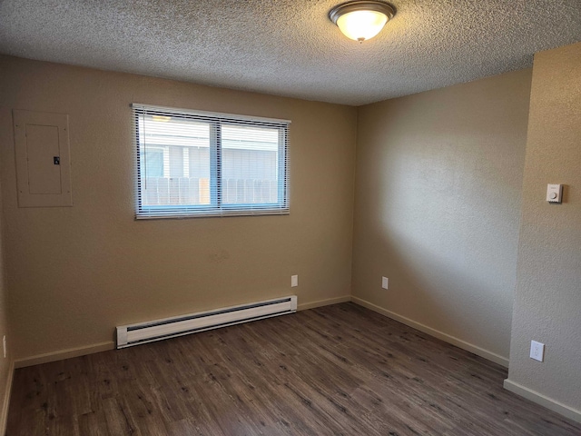 unfurnished room featuring a textured ceiling, baseboard heating, electric panel, and dark hardwood / wood-style flooring