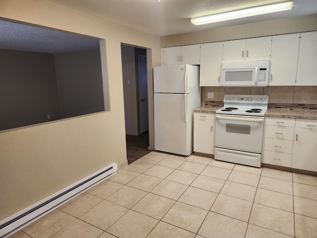 kitchen featuring white appliances, a baseboard radiator, backsplash, white cabinets, and light tile patterned floors