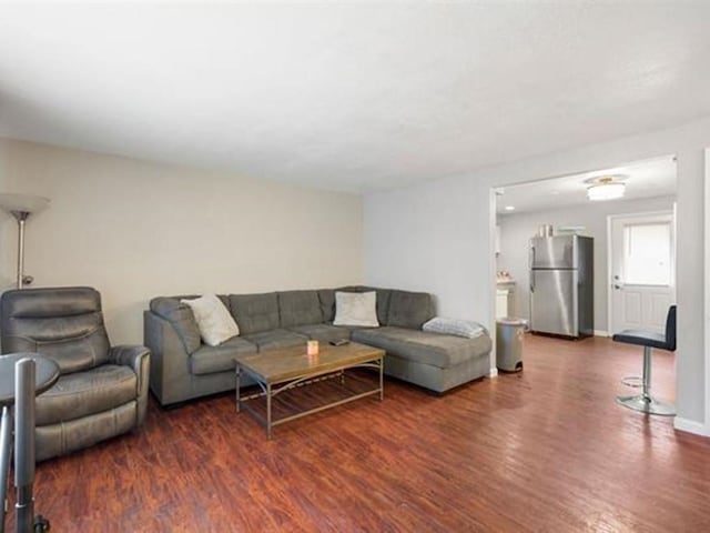 living room featuring dark hardwood / wood-style floors