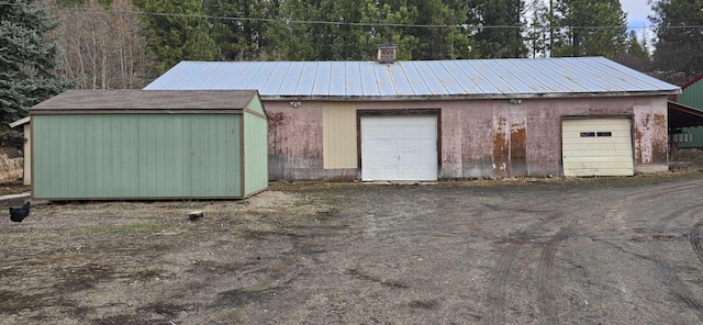 view of detached garage