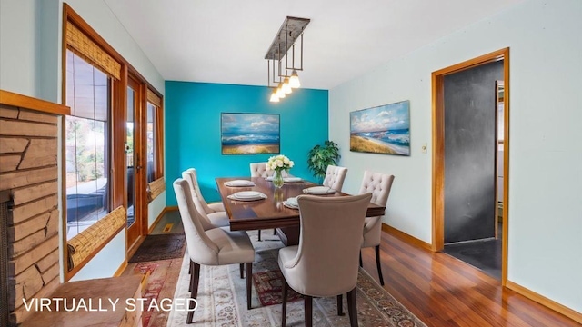 dining room featuring dark hardwood / wood-style flooring