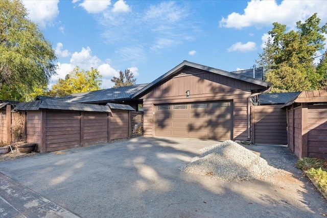 view of side of home with a garage