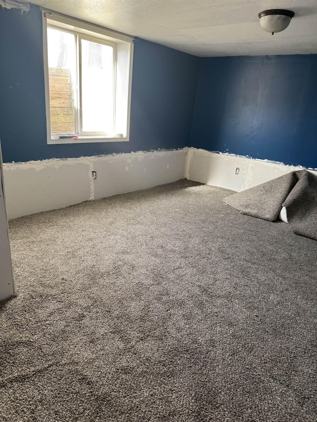 interior space with a textured ceiling