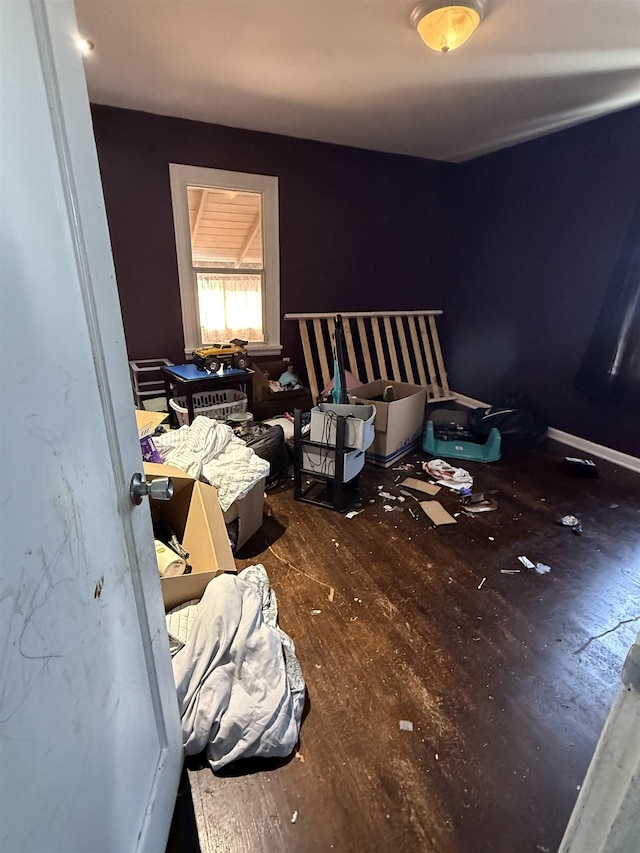 bedroom featuring wood finished floors