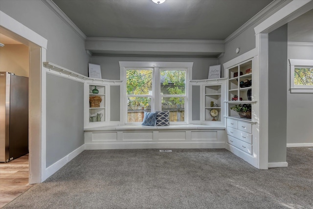 interior space featuring crown molding