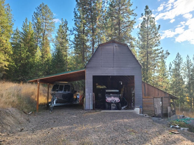 garage with a carport