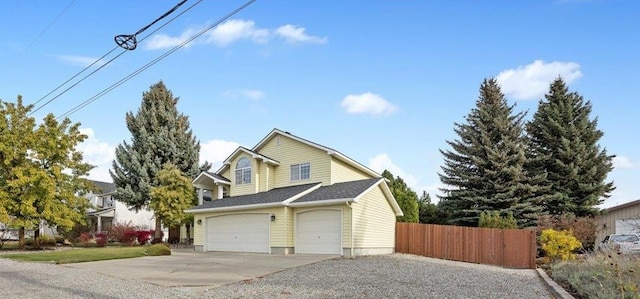 view of front of home with a garage