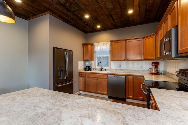 kitchen with wooden ceiling, tasteful backsplash, stainless steel appliances, and sink