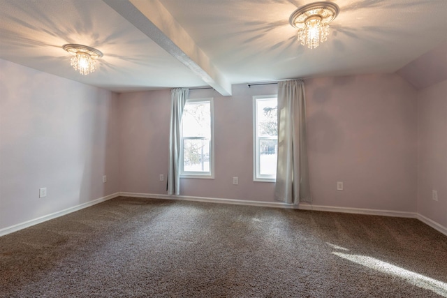 empty room featuring carpet, an inviting chandelier, and vaulted ceiling with beams