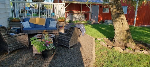 view of yard featuring outdoor lounge area and a shed