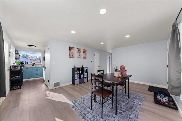 dining area featuring light hardwood / wood-style flooring