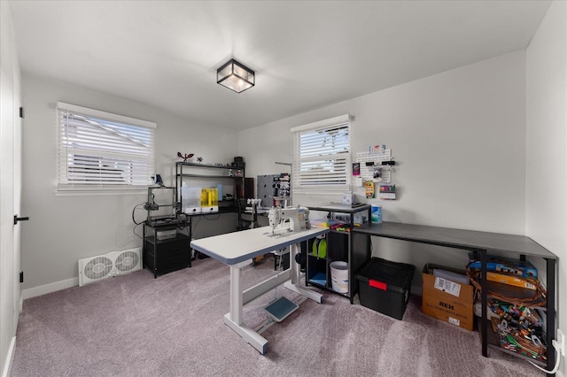 office area featuring baseboards and carpet floors