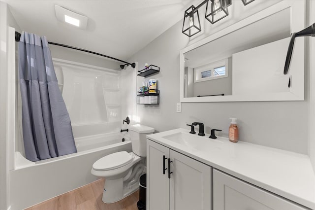 bathroom with vanity, shower / bath combination with curtain, toilet, and wood finished floors