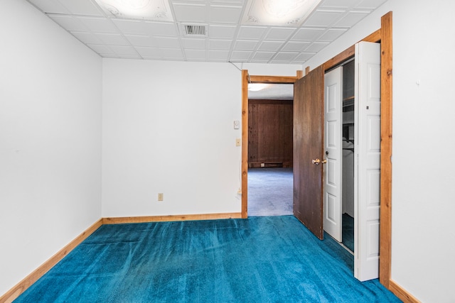 unfurnished room featuring carpet flooring