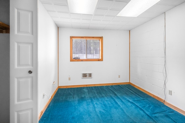 empty room with a drop ceiling