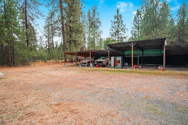 view of yard featuring a carport