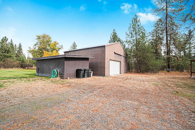 view of outdoor structure with a garage