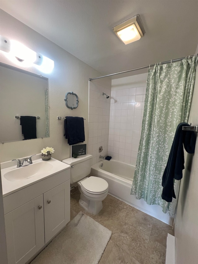 full bathroom featuring toilet, shower / bath combo, and vanity