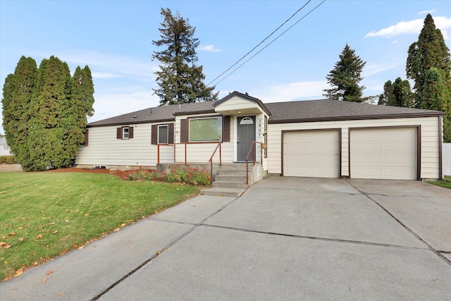 ranch-style home with a front lawn and a garage