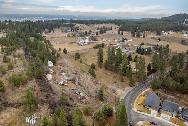 birds eye view of property featuring a rural view