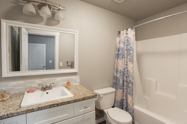 full bathroom featuring toilet, shower / tub combo with curtain, tasteful backsplash, and vanity