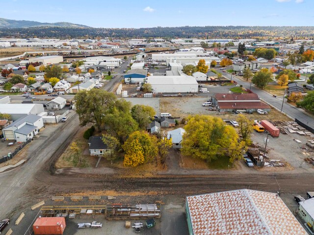 drone / aerial view featuring a mountain view