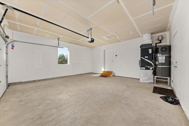 garage featuring strapped water heater, a garage door opener, and heating unit