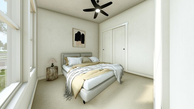 bedroom with a closet, ceiling fan, and carpet