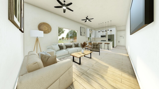 living room featuring light hardwood / wood-style flooring and ceiling fan