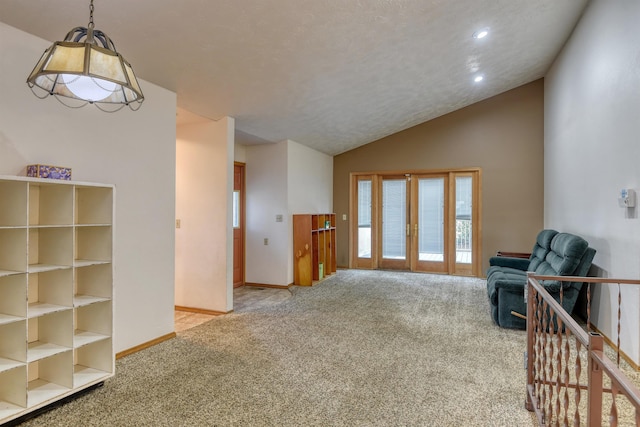 3224 E 28th Ave, Spokane, WA 99223 - sitting room with baseboards, recessed lighting, carpet floors, and vaulted ceiling