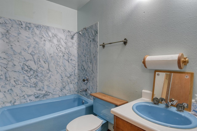 full bathroom with toilet, vanity, and  shower combination