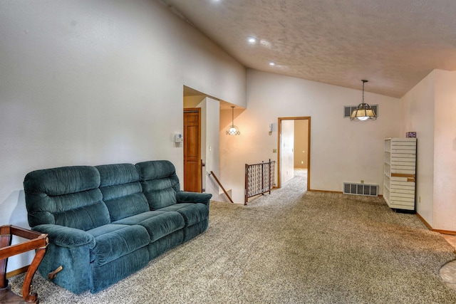 3224 E 28th Ave, Spokane, WA 99223 - living area with lofted ceiling, carpet flooring, visible vents, and recessed lighting
