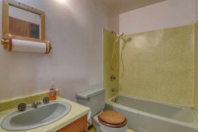 full bathroom with vanity, tub / shower combination, and toilet