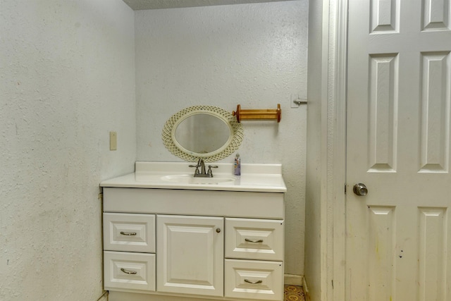 3224 E 28th Ave, Spokane, WA 99223 - bathroom featuring vanity and a textured wall