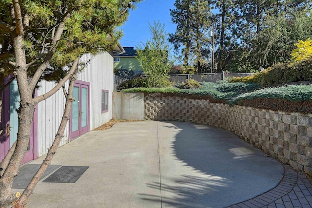 3224 E 28th Ave, Spokane, WA 99223 - view of patio featuring fence and french doors