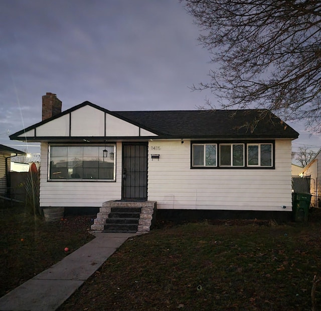 1415 E Dalke Ave, Spokane, WA 99208 - view of front facade with a chimney