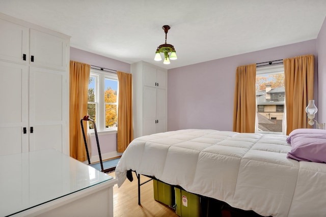 bedroom featuring light hardwood / wood-style flooring