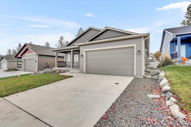 ranch-style house with a front yard, a porch, a garage, and driveway