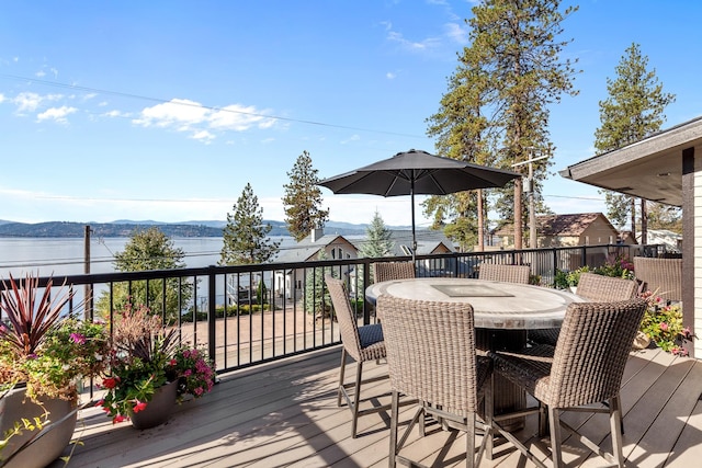 deck featuring a water and mountain view