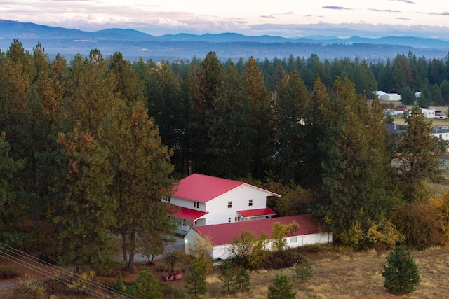 aerial view at dusk with a mountain view