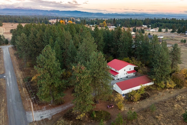 aerial view at dusk with a mountain view