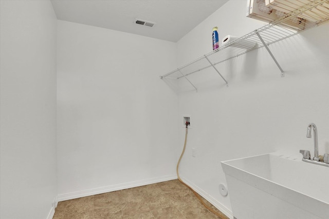 1005 S Oswald St, Spokane, WA 99224 - laundry room with baseboards