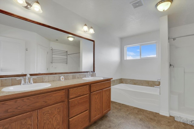 1005 S Oswald St, Spokane, WA 99224 - bathroom featuring a bath, double vanity, and a shower